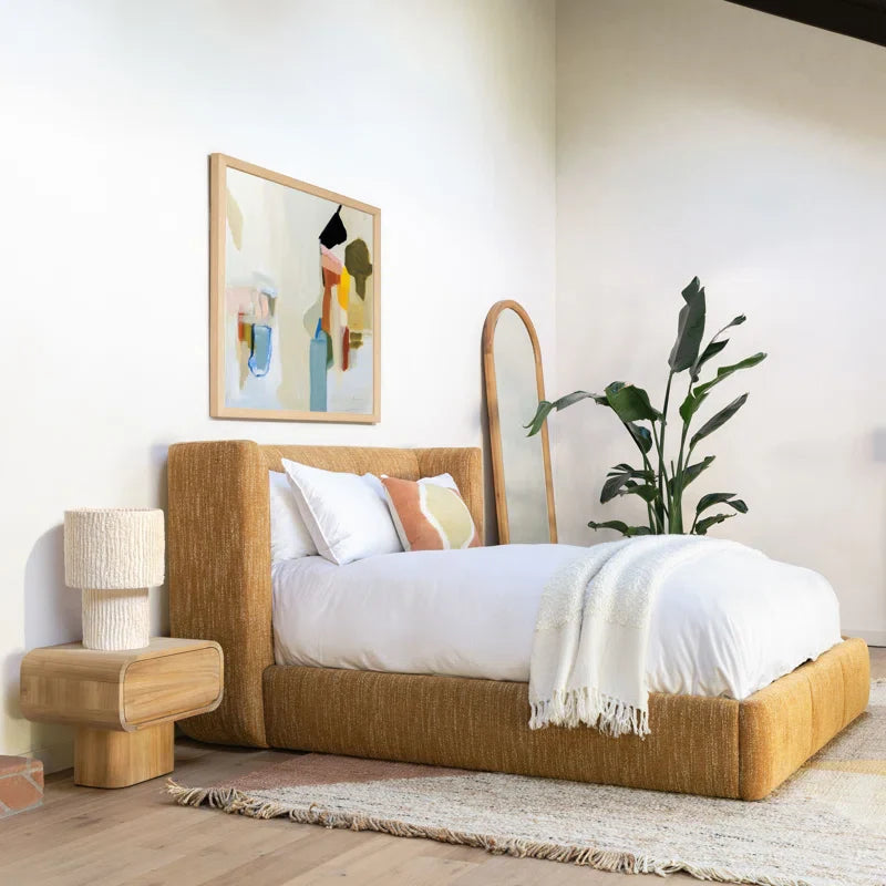 Clarisse Upholstered Wingback Bed