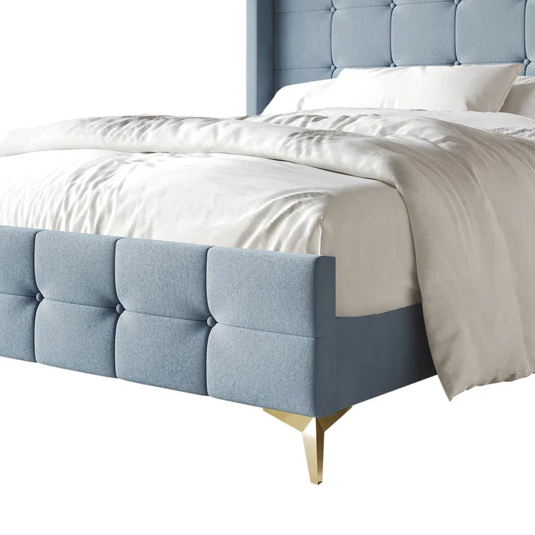 Karmane Upholstered Wingback Bed
